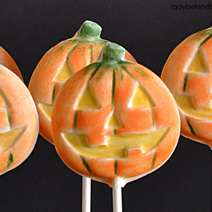 White Chocolate Jack-O-Lantern Pumpkin Pops