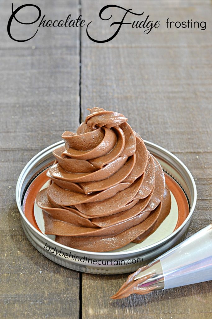 Chocolate Fudge Frosting, strawberry, chocolate, and vanilla cupcakes