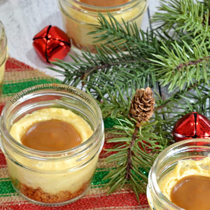 Mini Eggnog Cheesecakes with a Rum Caramel Drizzle