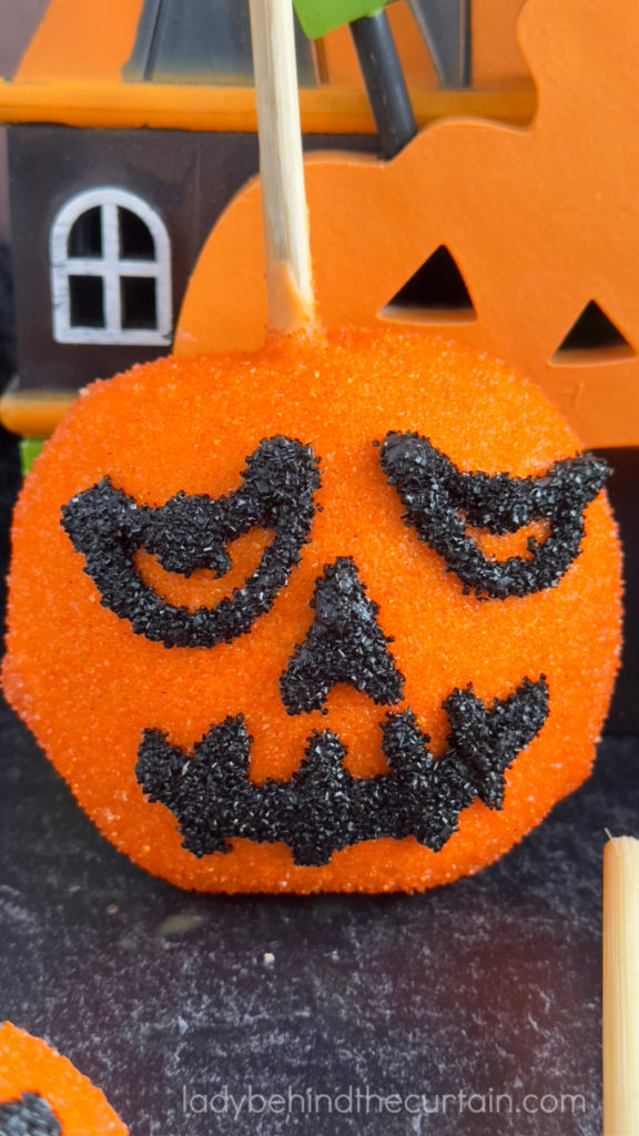 Jack-O-Lantern Caramel Apple Slice Pops